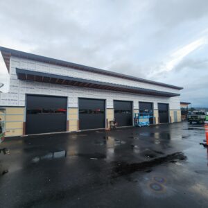 Commercial garage doors Sumner WA Clopay 3200 insulated 12x12 black steel door with glass