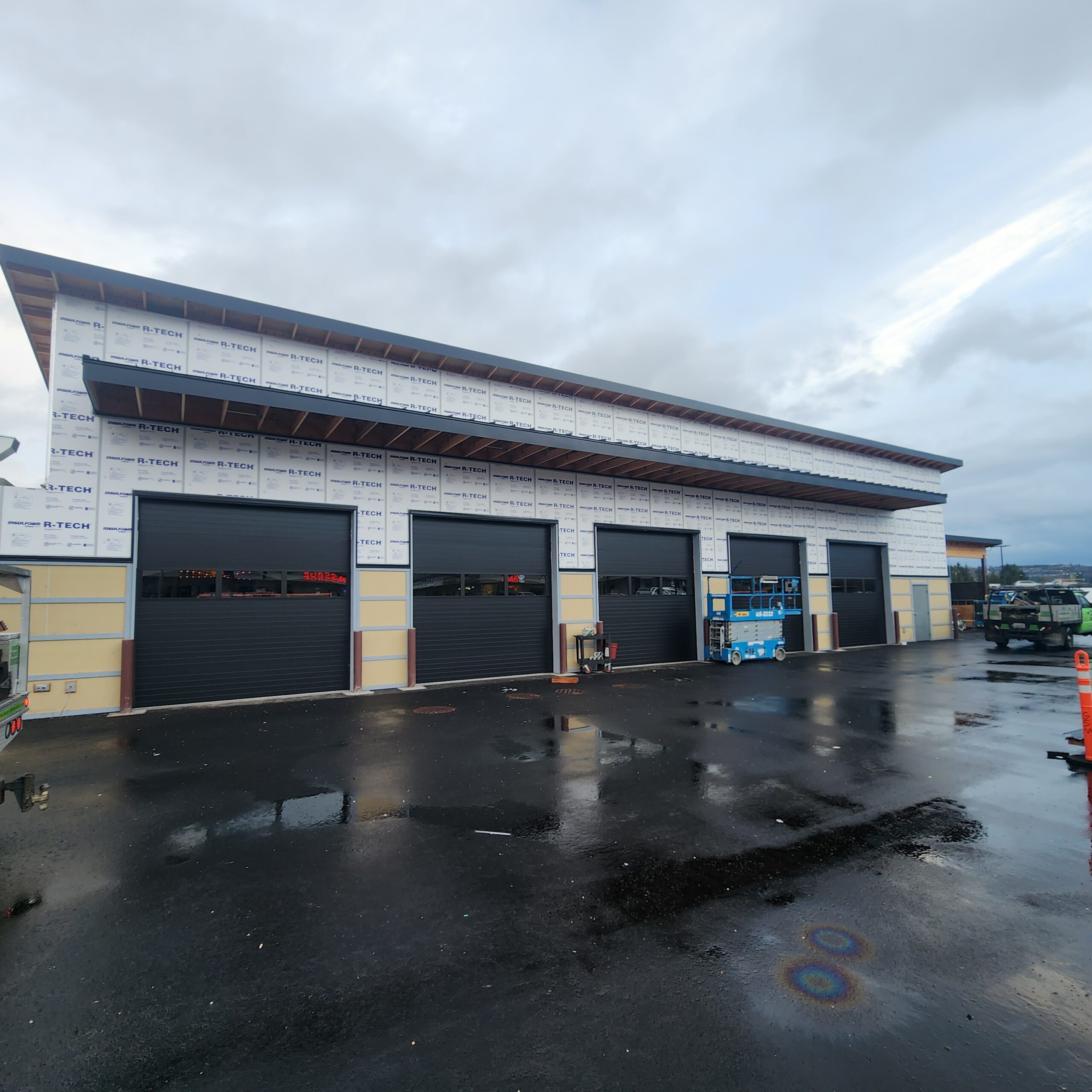 Commercial garage doors Sumner WA Clopay 3200 insulated 12x12 black steel door with glass