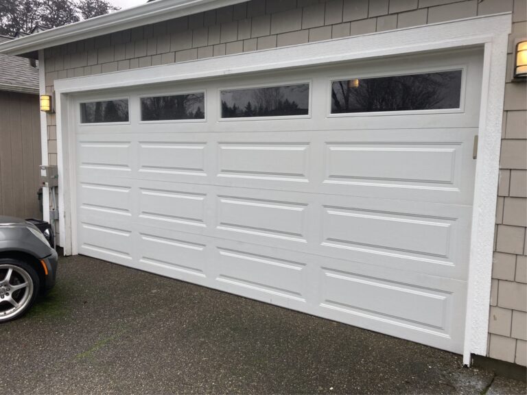 Insulated garage door installation Olympia WA Clopay 4053 16x7 with windows