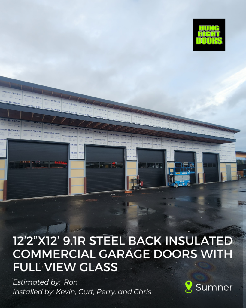 Clopay 3200 insulated commercial garage doors installed in Sumner, WA by Hung Right Doors.