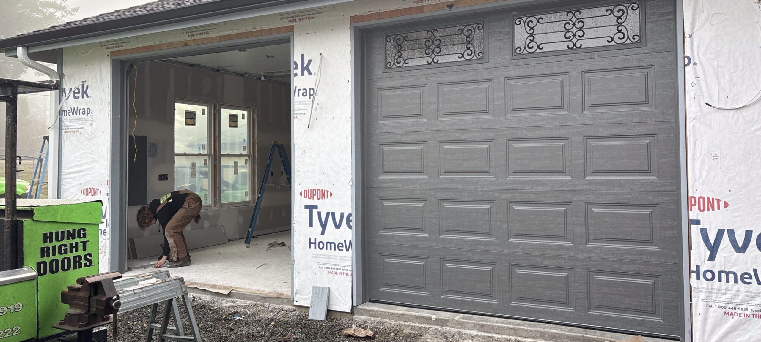 Garage door repair Olympia WA technician fixing residential garage door